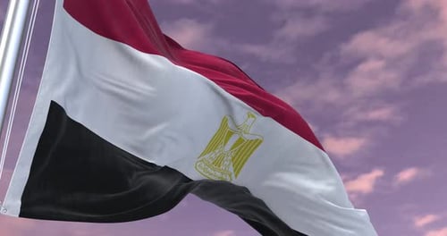 Realistic Egyptian Flag Waving in Slow Motion Against Cloudy Sky
