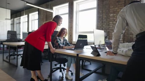 Team Collaborating at Modern Open Office Workplace