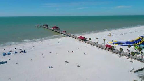 Drone flying above Pier 60 going in Clearwater Beach, FL flying out to the Gulf of Mexico