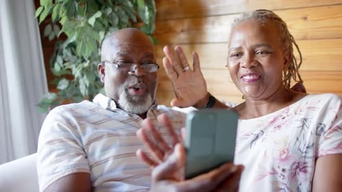 Senior Couple Video Chatting on Smart Phone