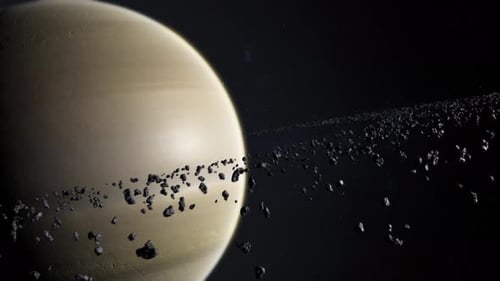 Cinematic 3D Saturn planet animation with asteroid or space rocks ring orbiting.