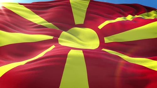 North Macedonia Flag Waving in Seamless Loop with Sunlight