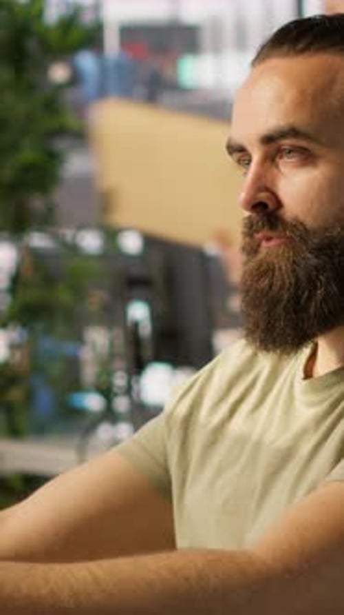Man in Wheelchair Working in Office