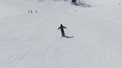 Drone Of Skier Skiing On Mountain Snow