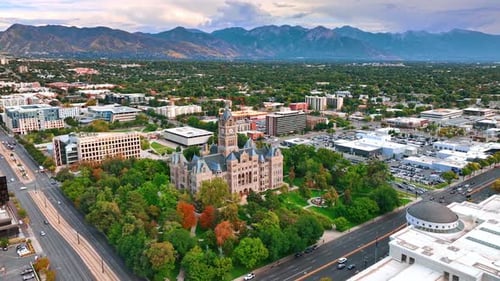 Salt Lake City and County Building surrounded by the green park.