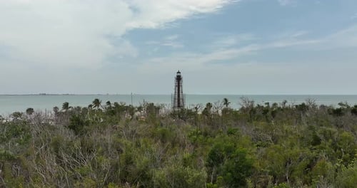 Drone view of Sanibel Lighthouse being repaired post hurricane Ian