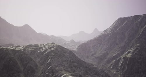 Majestic Mountain Landscape with Soft Lighting at Dusk in Serene Wilderness