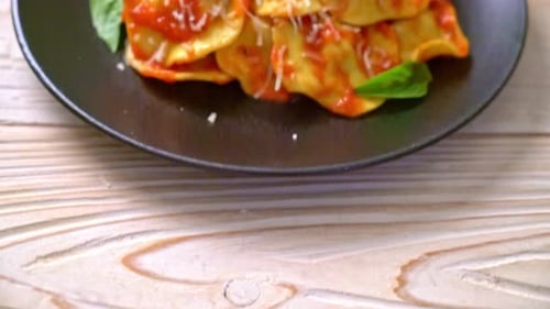 Ravioli with tomato sauce and basil