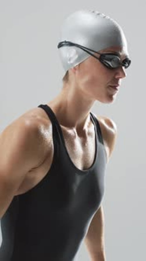 Female Swimmer in Swim Cap and Goggles
