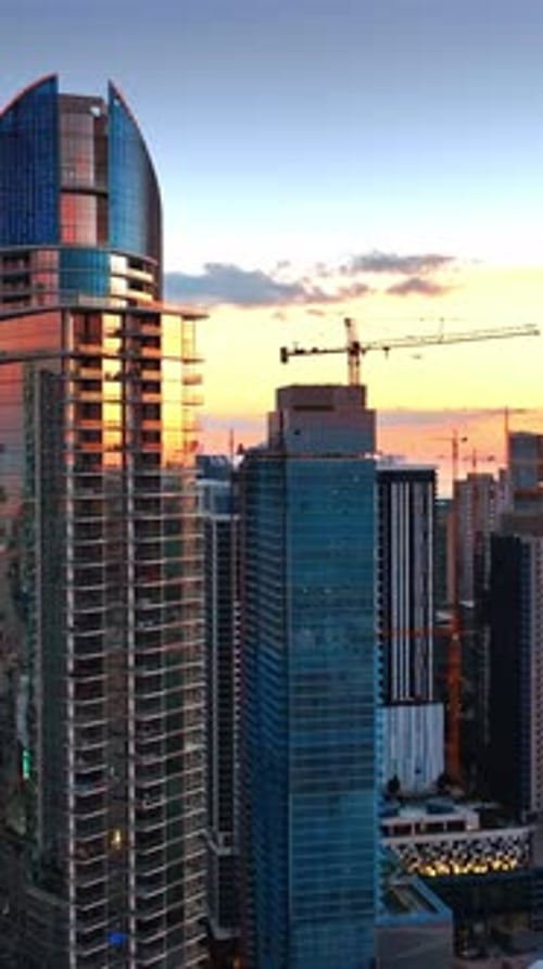 Eye-catching view of Miami downtown with beautiful skyscrapers reflecting sun down light