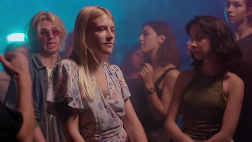 Young Women Dance Energetically in a Lively Club Celebrating Joy