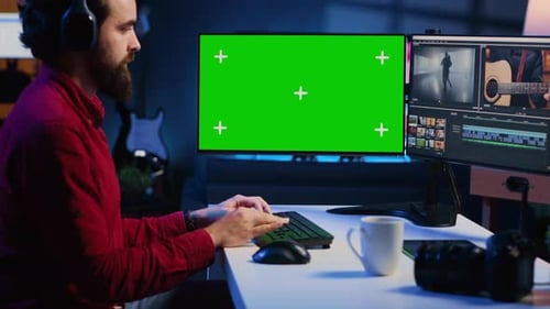 Expert Using Post Production Techniques to Edit Raw Clips Footage on Isolated Screen Monitor