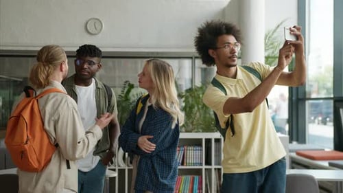 Four Multiracial Students Talking in University African American Male Calling Friends for Making