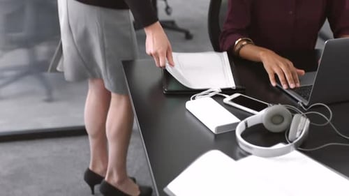 Busy Team Working Collaboratively in Modern Office