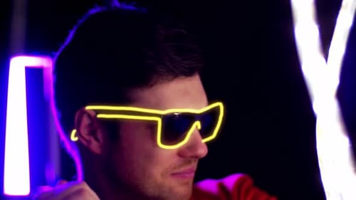 Leisure, Music and Nightlife Concept - Portrait of Smiling Young Man In