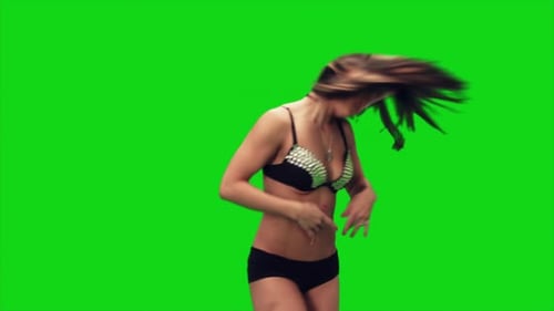 Young Asian Woman In Pole Dance Outfit Dancing Over Green Screen Background