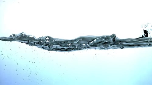 Super Slow Motion Blue Water Waves with Air Bubbles Filmed on a Highspeed Camera at 1000 Fps