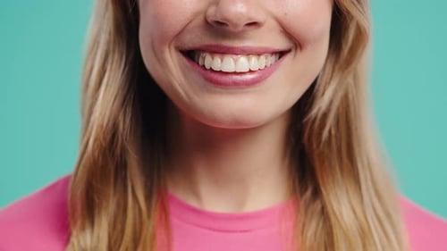 CloseUp Of Female Mouth With Bright White Smile Natural Lips And Perfect Teeth