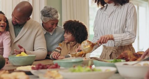 Family Celebrates Together Around Table in Bright Home