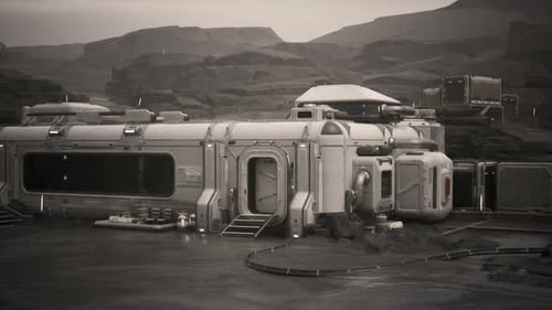 Colonist Base Established on a Distant Planet with Rugged Terrain and Habitats