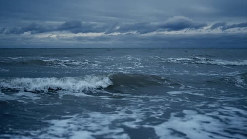 Stormy Sea Landscape Splashing on Beach Horizon Line Background. Dark Ocean Waves