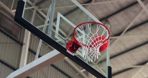 Empty, match and basketball in net, hoop and competition in campus court