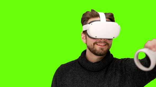 Close up of man in latest modern white oculus quest 2 vr ar headset ...