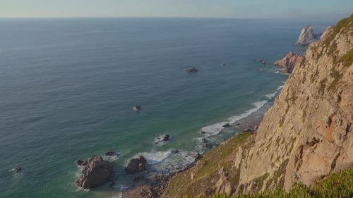 Beautiful scenic view of Portugal cliffs in slow motion with copy space.
