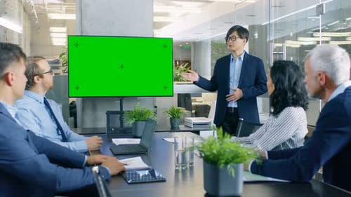 Business Team Meeting in Modern Office with Chroma Screen
