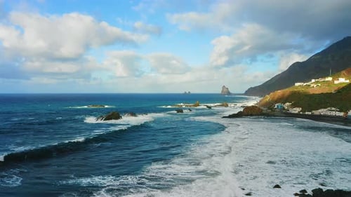 Aerial mountain ocean nature landscape peaceful background. Low flying over water sea surface in sto
