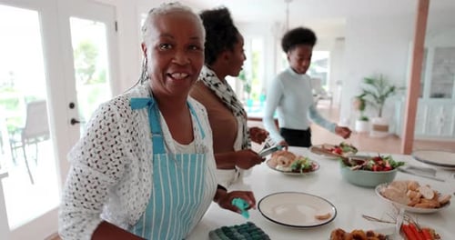 Women Making Food in Modern Bright White Kitchen