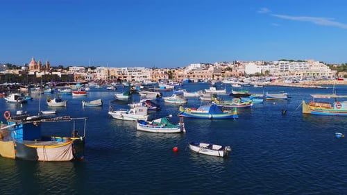 Aerial Panorama of Marsaxlokk Harbour with Domed Church View