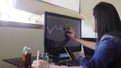 Business trader using crypto exchange app for investment and stock market analysis at office bank