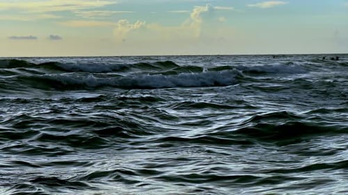 Ocean Wave at Sunrise Slow Motion Shot