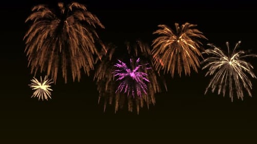 Shining golden fireworks celebration background with glittering bokeh lights in night sky
