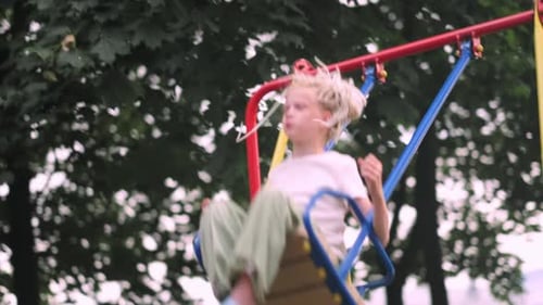 Girl Swinging on Swing in Park Child Having Fun Playing on Outdoor Public Playground Kids Play on