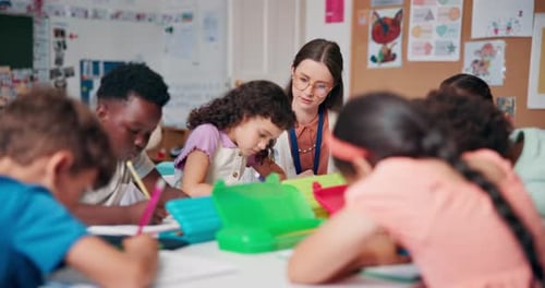 Students Learning Together in a Classroom with Teacher