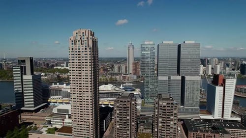 New Orleans And De Rotterdam Towers With Nieuwe Maas River Revealed. Rotterdam, Netherlands. orbitin