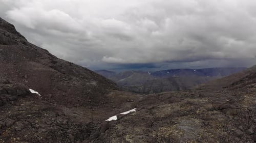 Behind the Pass There is a Beautiful View of the Mountain Valley