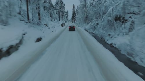 EV Opel Ampera driving in beautiful snowy landscape in Norway