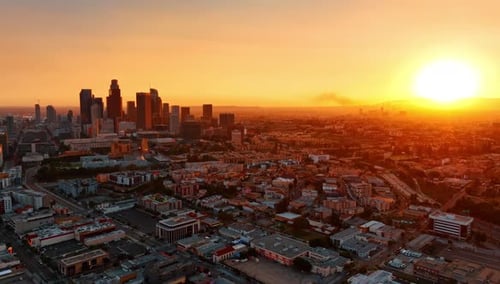 Panorama of Los Angeles, California, USA in the orange light of sunset.