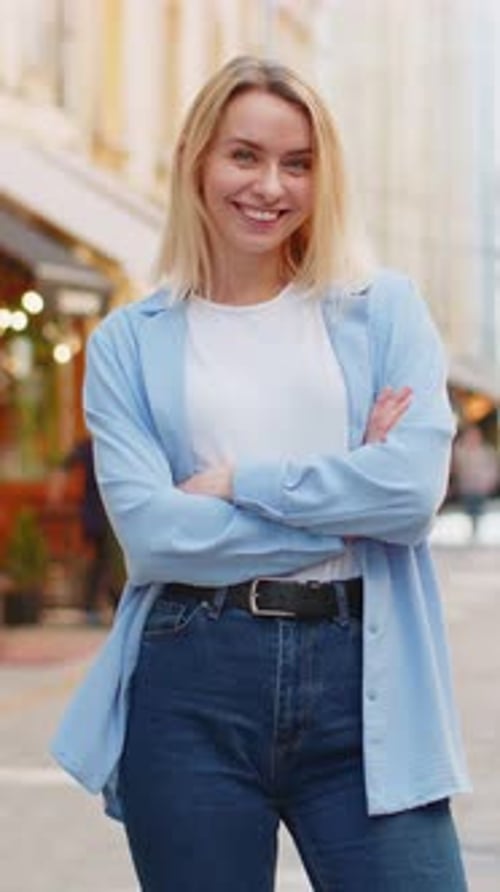 Happy Young Woman Smiling Turning Looking at Camera Resting Good News Feel Satisfied on City Street