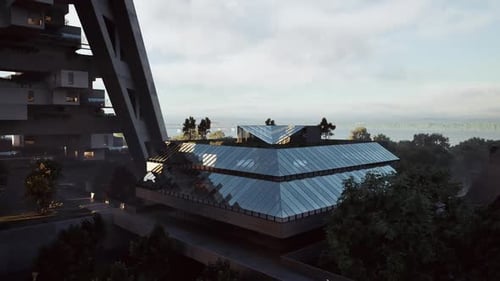 Diseño arquitectónico moderno de un edificio de cristal rodeado de vegetación