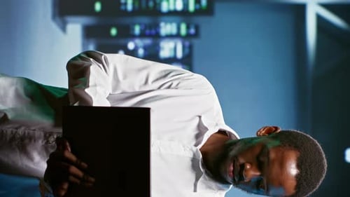 Smiling Man Using Tablet in Futuristic Workplace