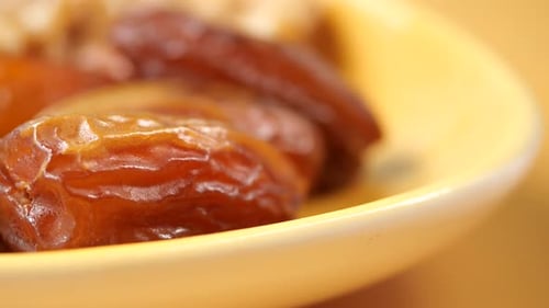 Close Up of Fresh Date Fruit in a Bowl on Table