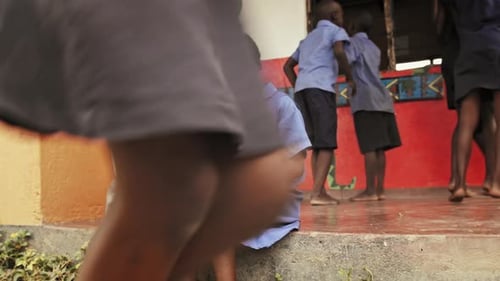 African schoolchildren use laptops during lunch break at school in malawi 4k