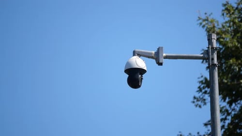 Surveillance Camera Monitoring City Activities From Above