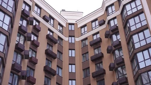 Wide Shot Modern Residential Building Outdoors on Cloudy Winter Day
