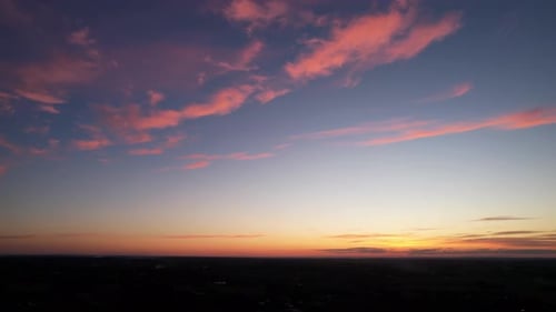 Late sunset against a slightly cloudy sky