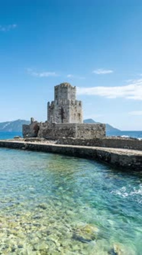 Bourtzi of Methoni Castle in Greece with Blue Clear Sea in Vertical